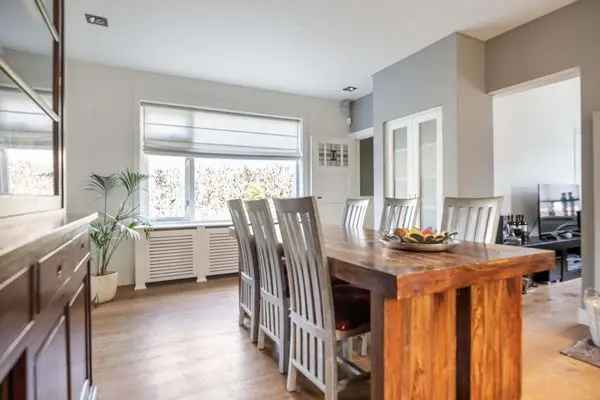 Apeldoornse Familievilla: 4 slaapkamers, 2 woonkamers, grote tuin