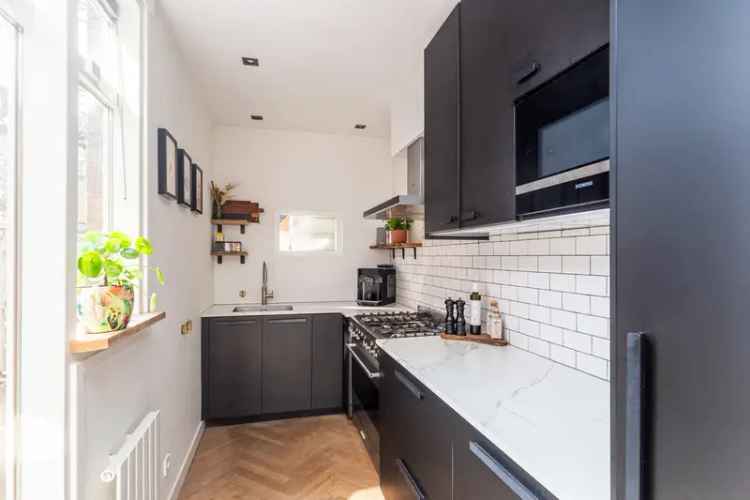 Jaren 30 woning Delft 3 slaapkamers moderne keuken tuin