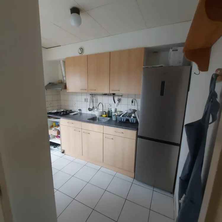 Appartement nabij scholen en winkels met bergzolder