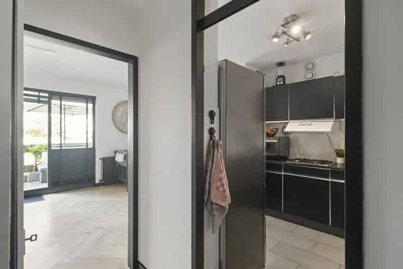 Licht appartement Den Helder: Balkon Tuinkamer Berging