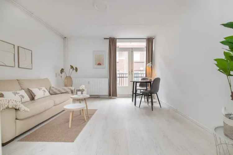 Amsterdam Centrum: Ruime 2-kamer Maisonnette op Eigen Grond