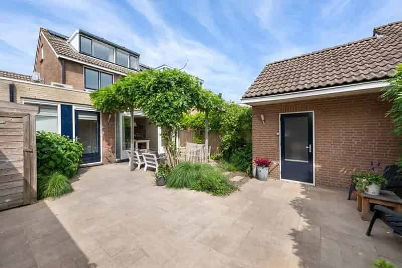 Grote gezinswoning Kruidenbuurt 4 slaapkamers zonnige tuin