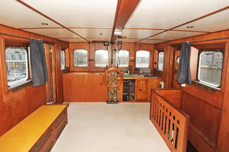 Woonschip te koop Wormerveer  Unieke sleepboot met uitzicht op de Zaan