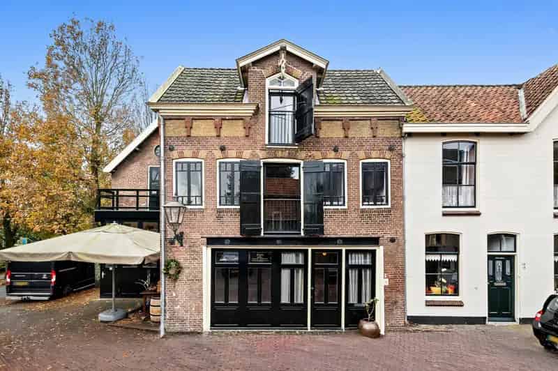 Pakhuis Maasland: Wonen en Werken in Gerenoveerd Gemeentelijk Monument