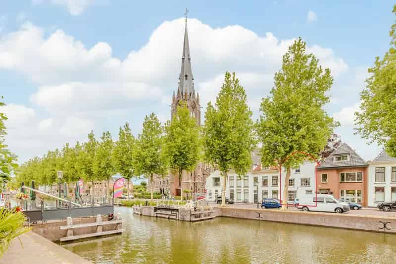 Huis te koop Herengracht Weesp: Grachtenpand met 3 woonlagen en tuin