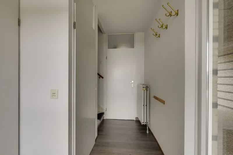 Huis te koop Leiden Stevenshof: Ruime poortwoning met dakterras en wijds uitzicht