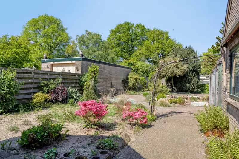 Huis te koop Ede: Ruime vrijstaande woning met grote tuin