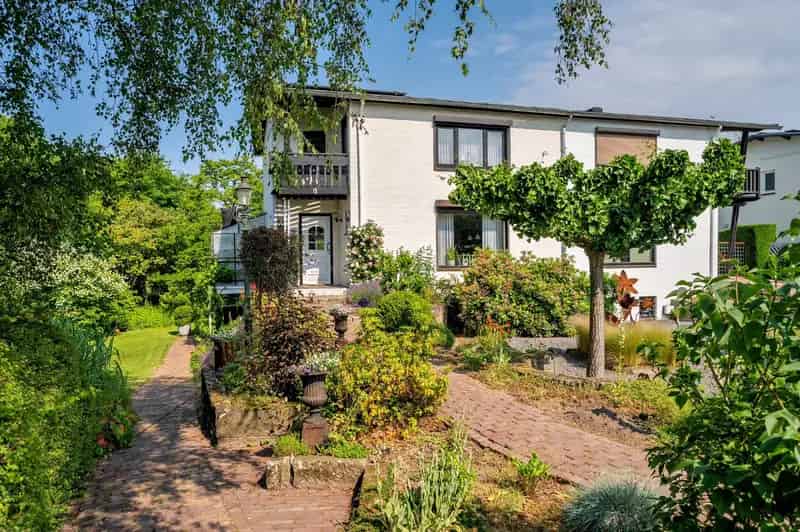 Ruime 2-onder-1-kapwoning in 't Ven met 4 slaapkamers en groot bijgebouw