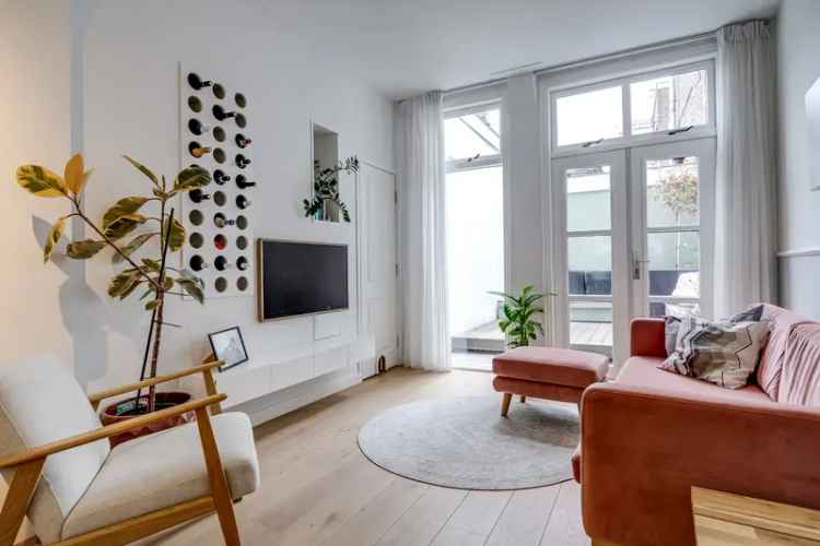 Goed onderhouden woning met dakterras nabij centrum