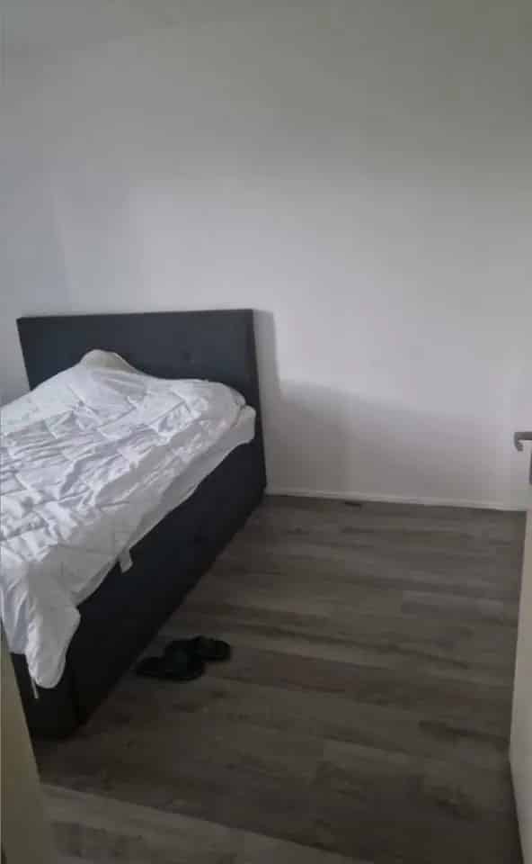 Kamer met balkon en uitzicht op Rotterdam