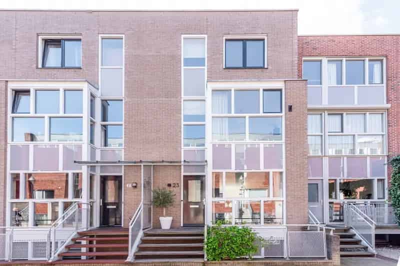 Huis te koop Apeldoorn: Luxe Stadswoning met Garage en Werkruimte