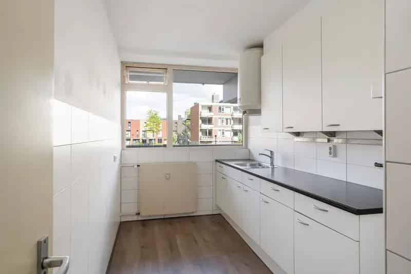 Gelijkvloers appartement Schiedam Groenoord: Ruim terras en Parkzicht