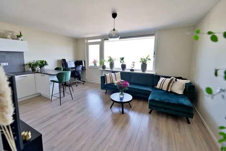 Appartement Gooimeer Huizen: Licht 2-kamer appartement met balkon en uitzicht