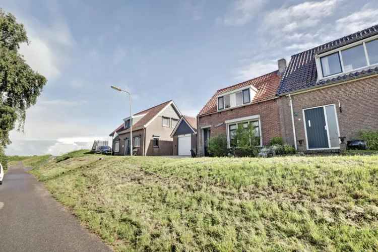 Sfeervolle Havenwoning Stavenisse: Moderne woning met 2 slaapkamers en uitzicht