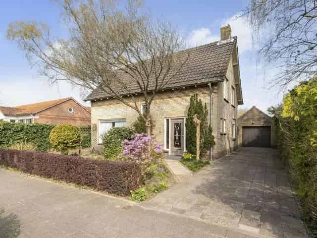 Vrijstaande woning Ulvenhout Grote garage Riante tuin