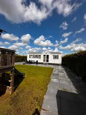 Chalet Friesland 4 personen te huur Grote tuin veel privacy