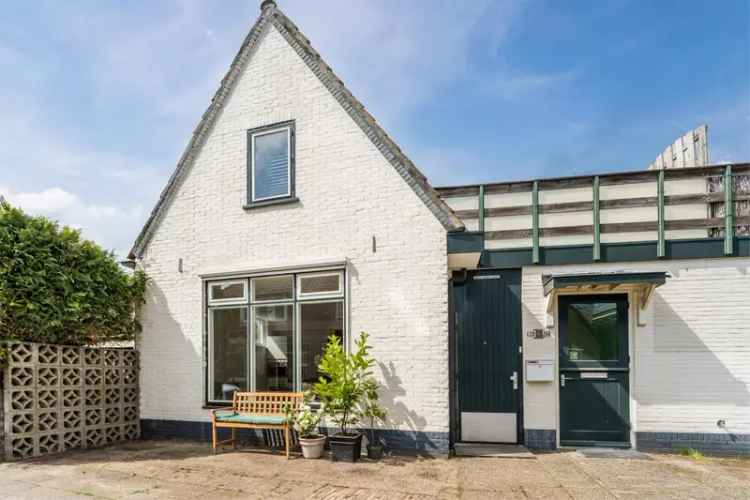 Huis te koop Sparrenlaan 28 Baarn: Instapklare woning met dakterras