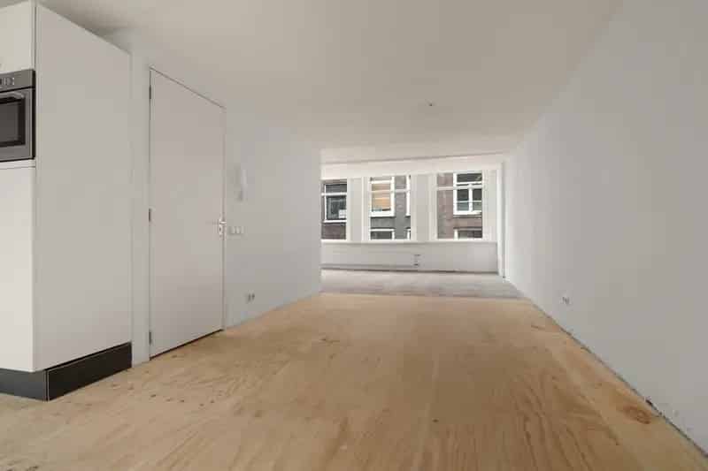 Amsterdam Binnenstad: Rijksmonumentale bovenwoning 142m2 4 slaapkamers