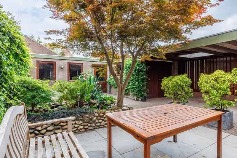 Huis te koop Bunnik: Charmante 2-onder-1-kap woning met garage en grote tuin