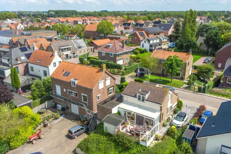 Uniek woonhuis Strijen Centrum met garage en serre