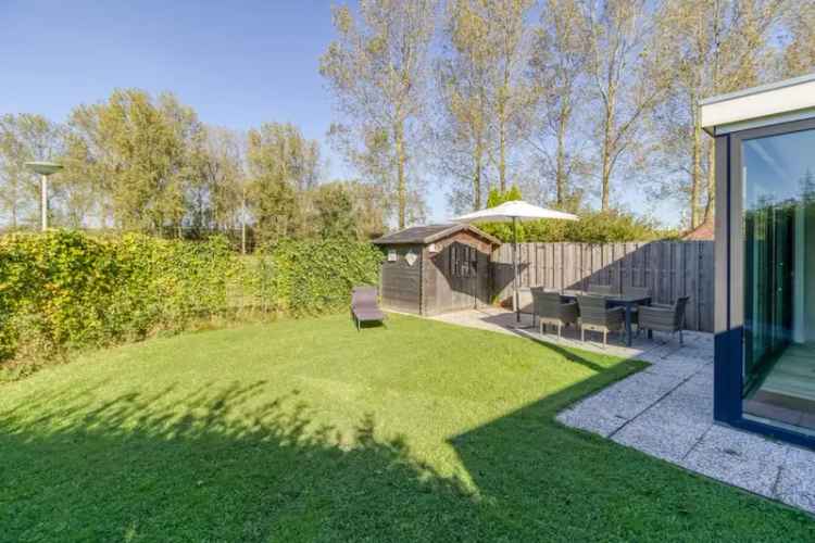 Recreatiewoning Nieuwvliet: Ruime Uitbouw, Tuin op het Westen, Strand Nabij