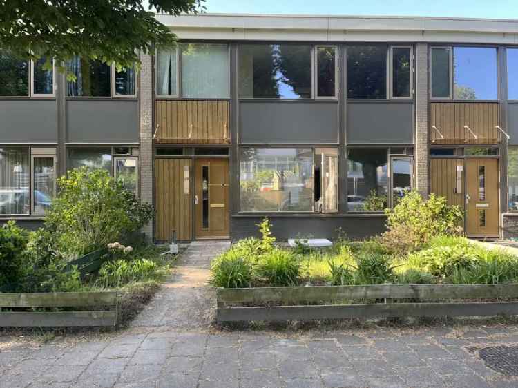 Tussenwoning 4 slaapkamers tuin op het zuiden Drunen