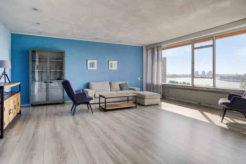 Luxe appartement Rotterdam Maas uitzicht parkeerplaats