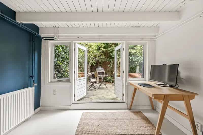Appartement te koop Rotterdam Bergpolder: Sfeervol dubbel benedenhuis met stadstuin