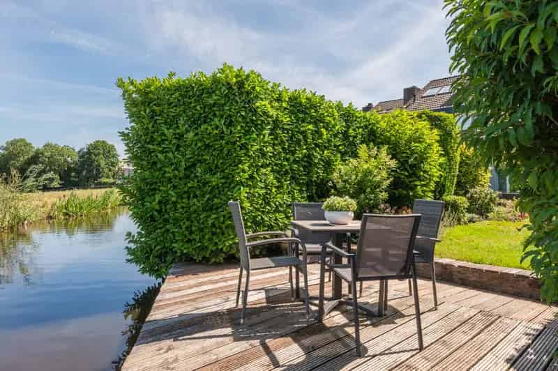 Huis te koop Mijdrecht: Ruime split-level woning met vrij uitzicht en sauna
