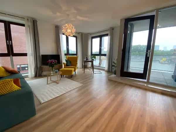 Appartement Mullerkade Rotterdam - Uitzicht Nieuwe Maas