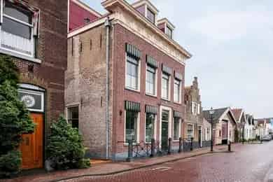 446 m2 Kantoorruimte te Koop in Brielle: Monumentaal Pand Wonen en Werken