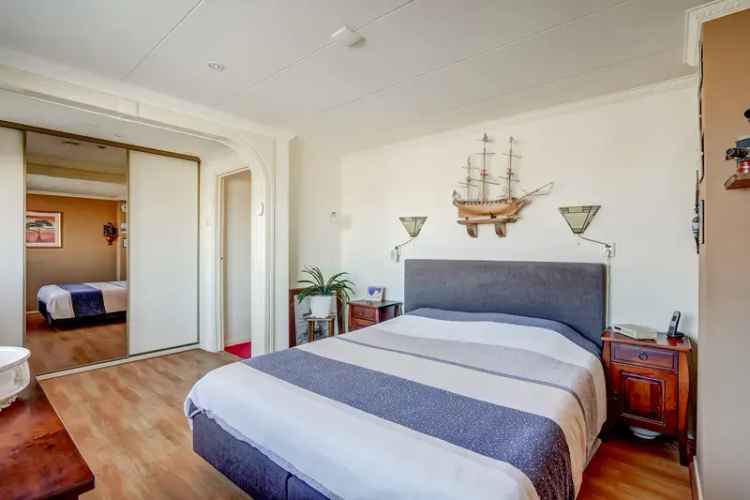 Huis te koop Krommenie: Ruime woning met tuin en uitbreidingsmogelijkheid
