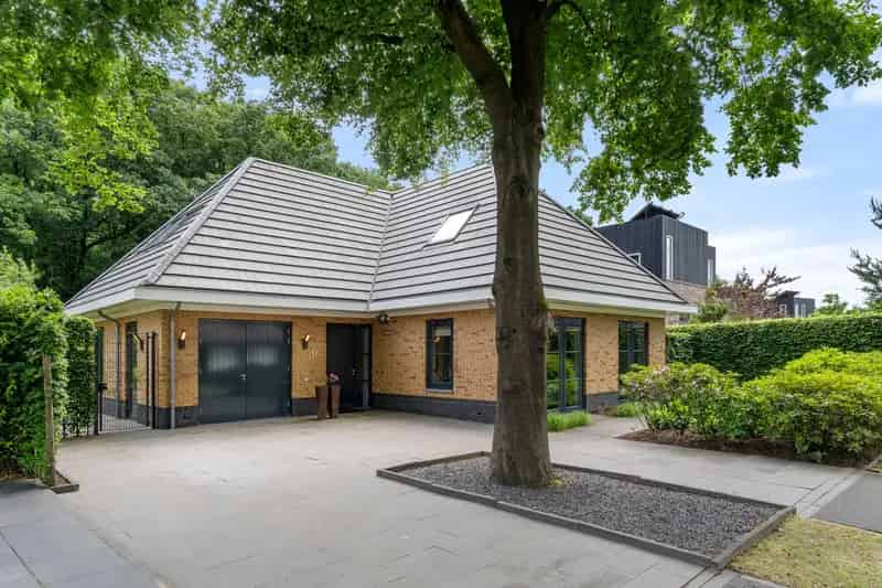 Luxe villa te Ede met lift en bosrijke tuin