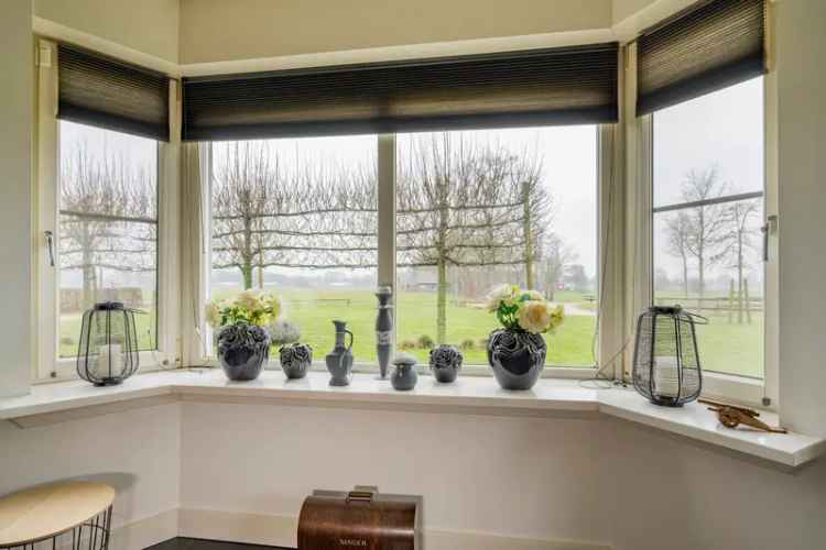 Landelijk wonen met 2 woningen, souterrain & bijgebouw