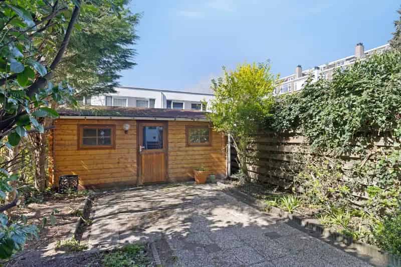 Appartement te koop Rotterdam Bergweg: Ruime Dubbel Benedenhuis met Tuin en Sauna