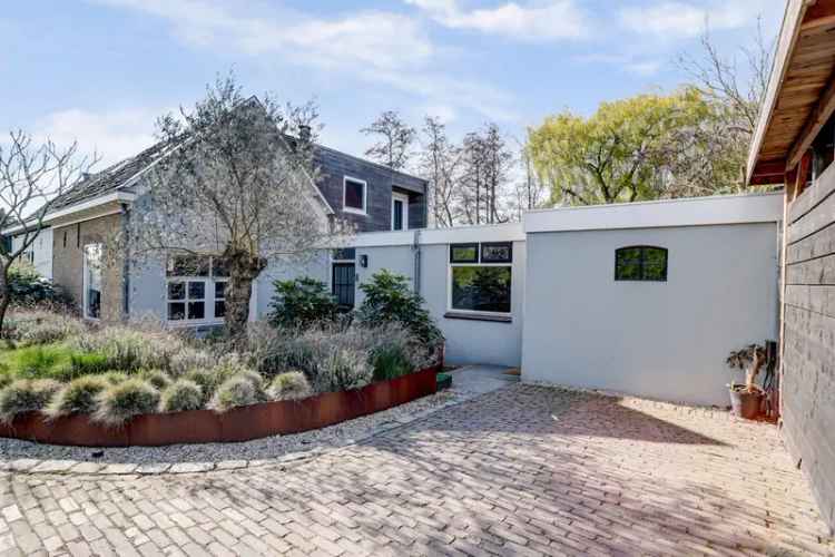 Sfeervolle 2-onder-1-kapwoning Maasdijk 128m2 4 slaapkamers