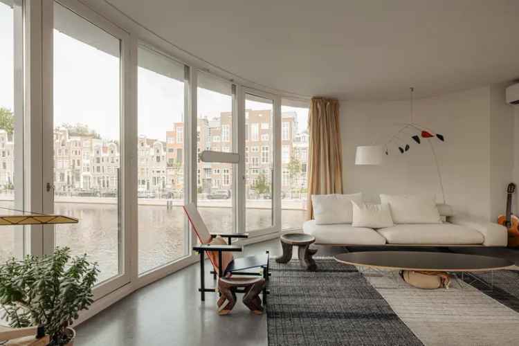 Huis te koop Amsterdam Entrepotdok: Vrijstaand aan het water