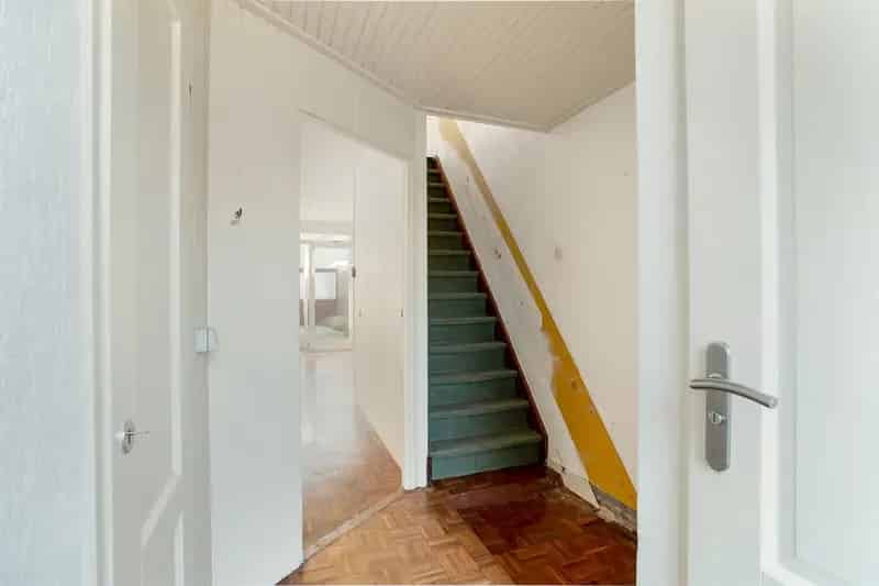 Tussenwoning te koop Oudenbosch: 3 slaapkamers, tuin en garage