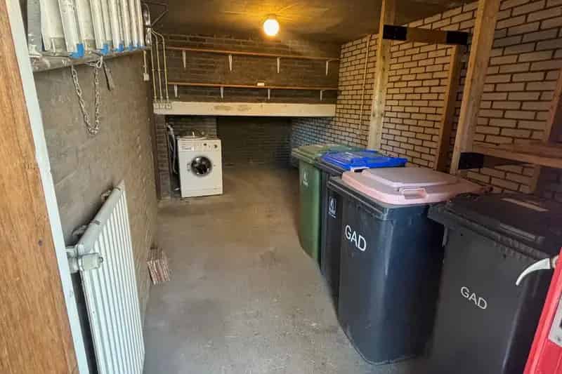 Huis te koop Muiden: Splitlevel Grachtenhuis met 3 slaapkamers en tuin