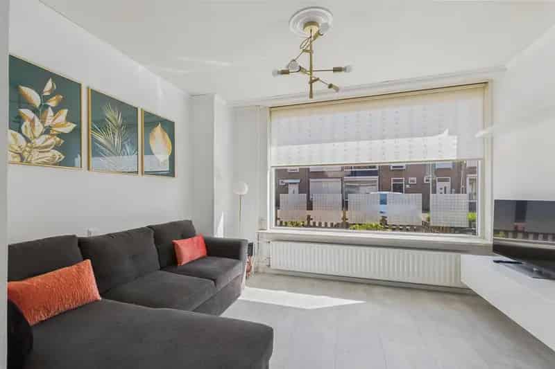Tussenwoning Terneuzen: Instapklaar met Serre en Tuin