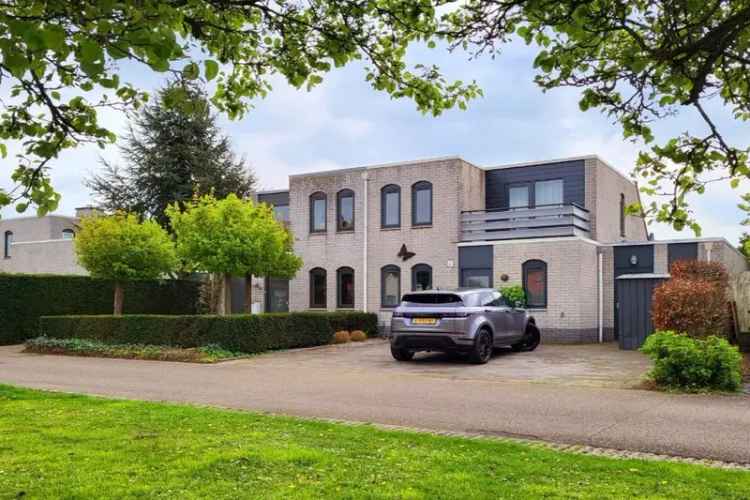 Huis te koop Lathum: Modern, aan het water, tuin met terrassen