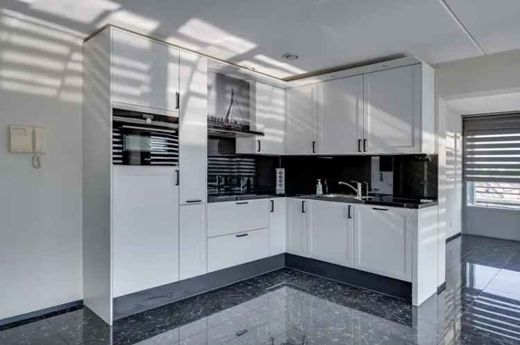 Penthouse te koop 's-Gravendeel 106m2 2 slaapkamers balkon parkeerplaats