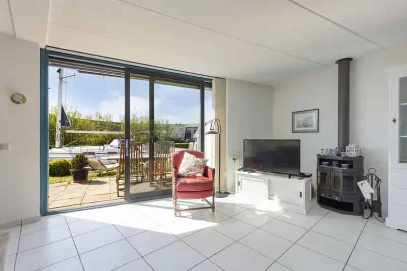 Waterwoning Lemmer: Tussenwoning met Aanlegsteiger