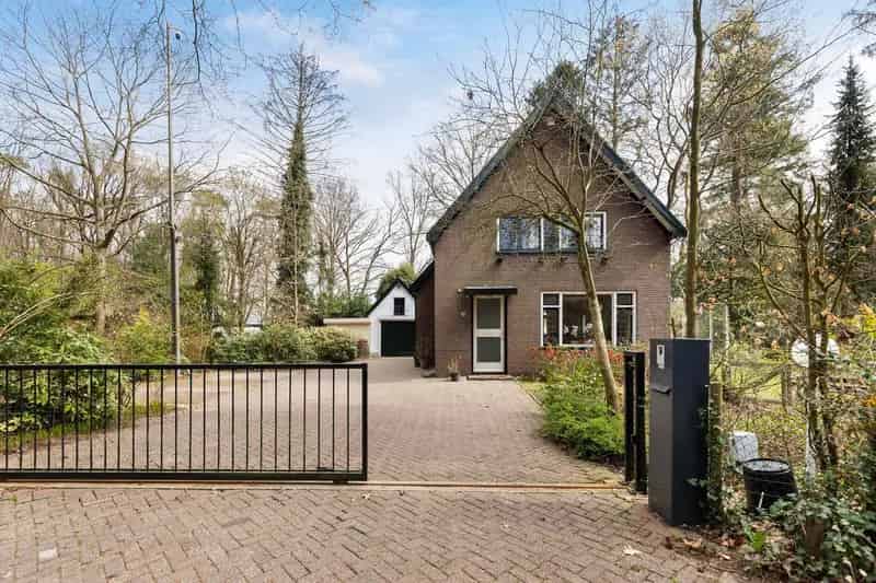 Jaren 30 woning Wenum Wiesel grote tuin stenen garage bijgebouw