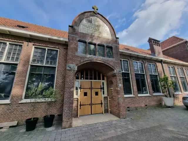 Appartement Kwadendamme Johan Frisostraat - Gerenoveerde School