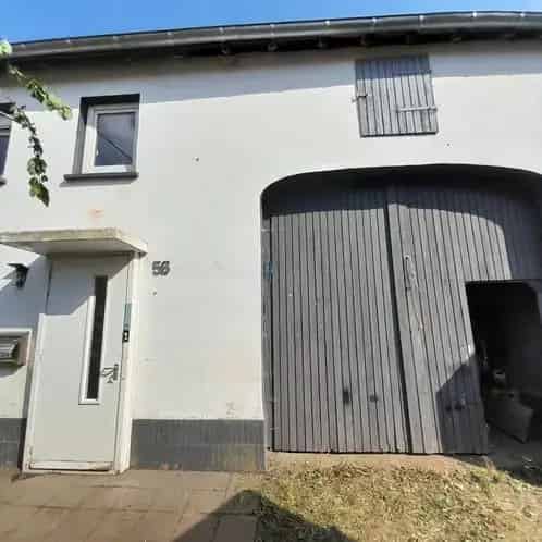 Eifel woning met bijgebouw en grote tuin