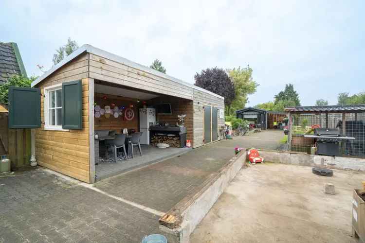 Vrijstaande woning Usselo grote tuin chalet zonnepanelen