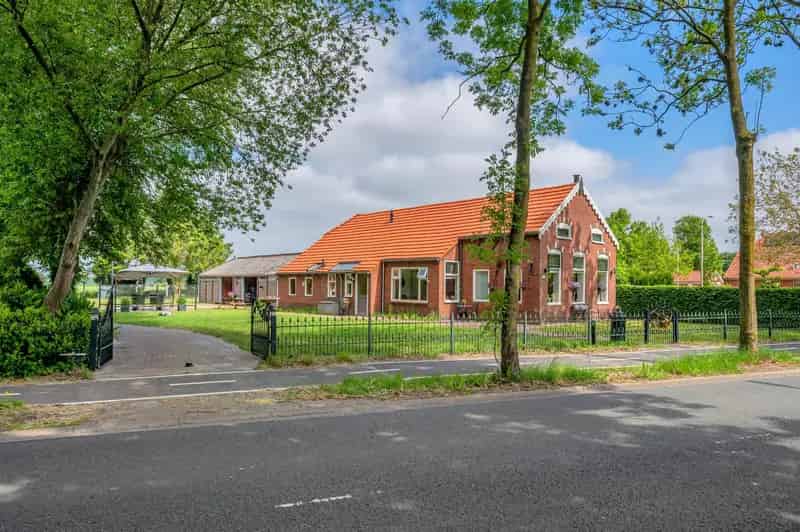 Vrijstaande woning Wedde: Ruime tuin, garage en tuinhuis
