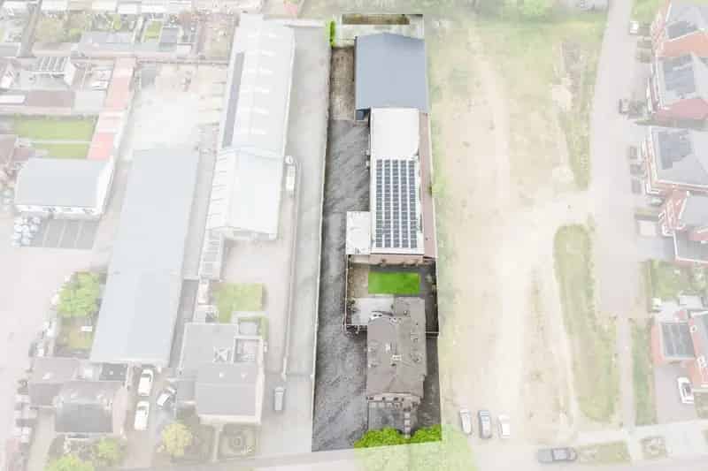 Bedrijfshal en woning te koop in Reusel 710m²