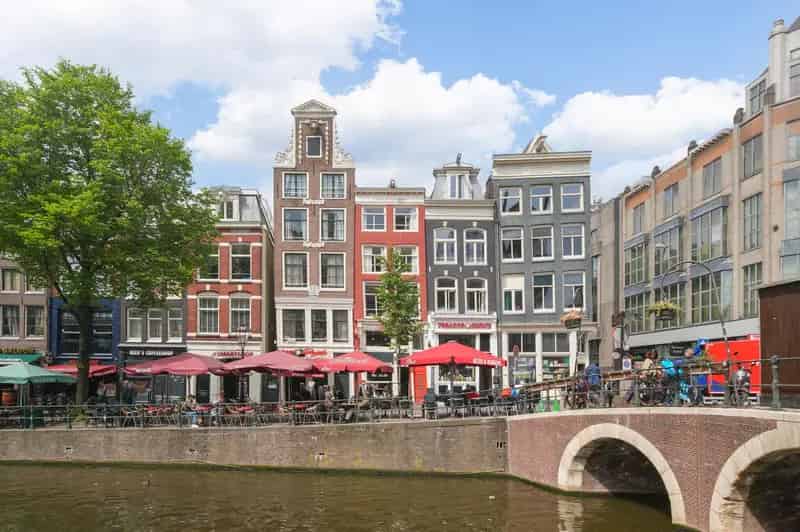 Amsterdam Grachtenpand: Uniek Bovenhuis met Dakterras